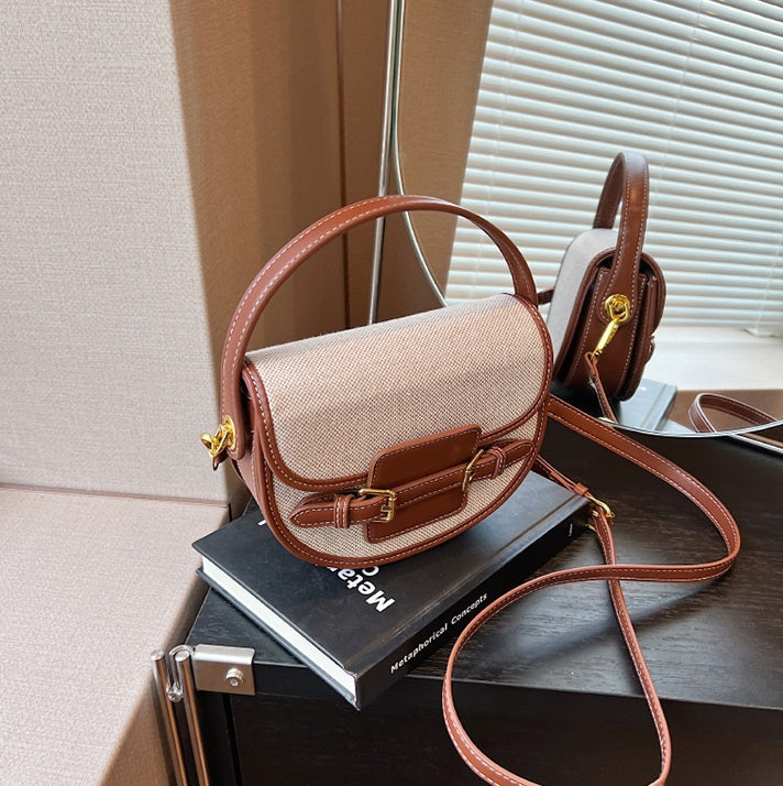 Natural and brown Sola Saddle Bag styled product angle